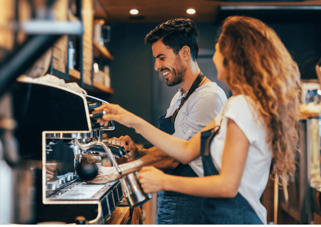 busy cafe team making coffee